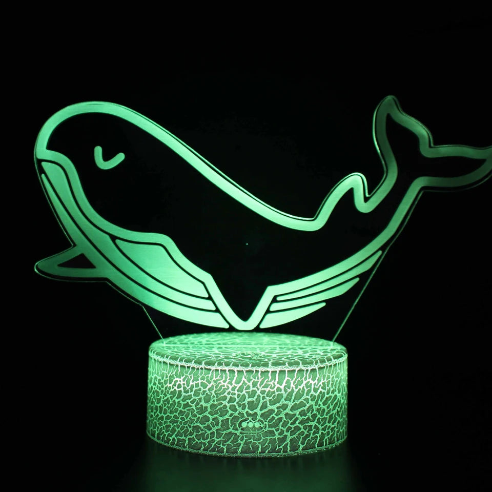 veilleuse baleine tactile qui change de couleur dans une restaurant