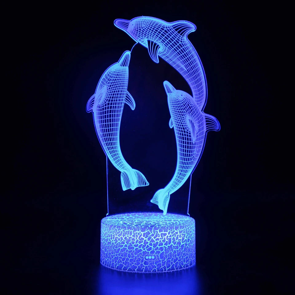 veilleuse baleine tactile qui change de couleur dans une salle de spectacle