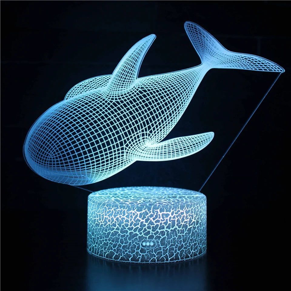 veilleuse baleine tactile qui change de couleur dans une boutique de luxe