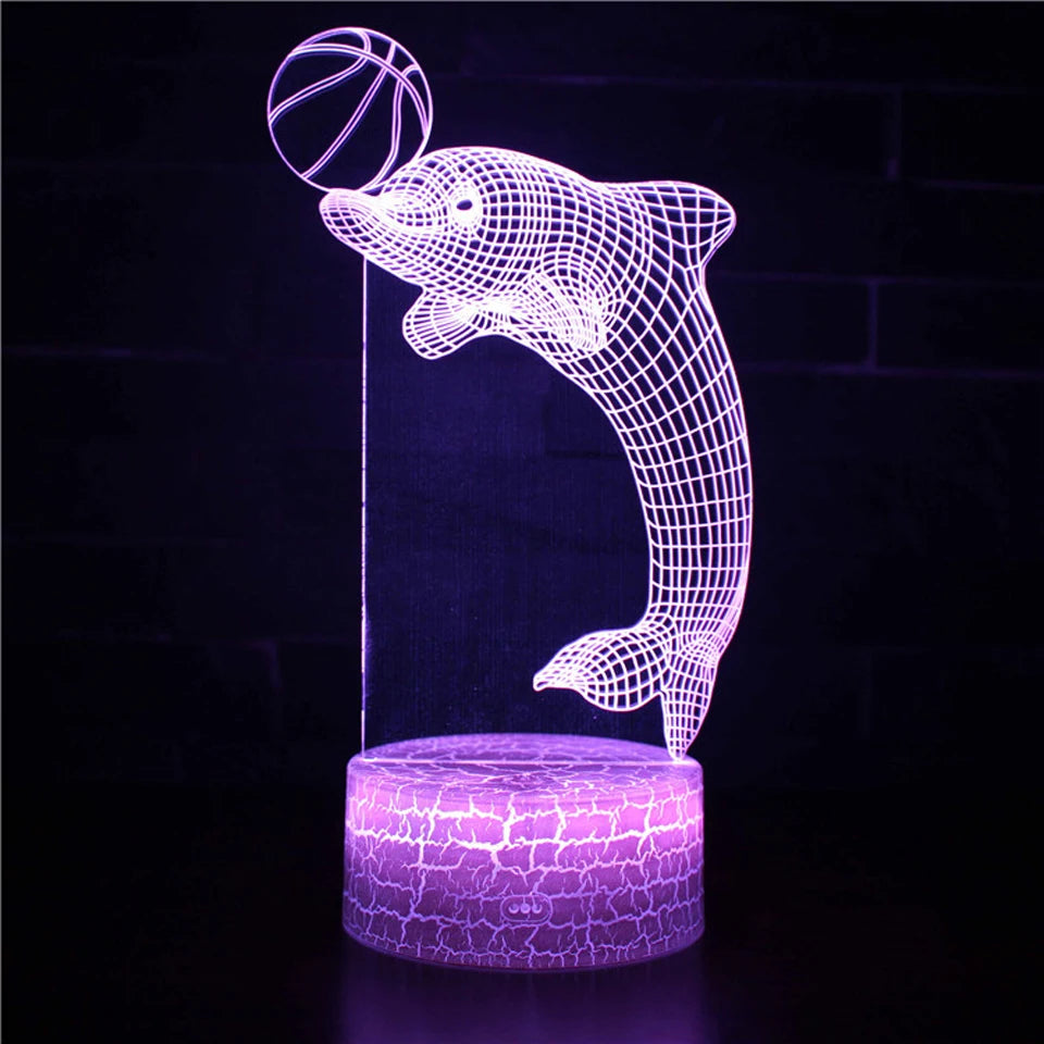 veilleuse baleine tactile qui change de couleur dans un studio