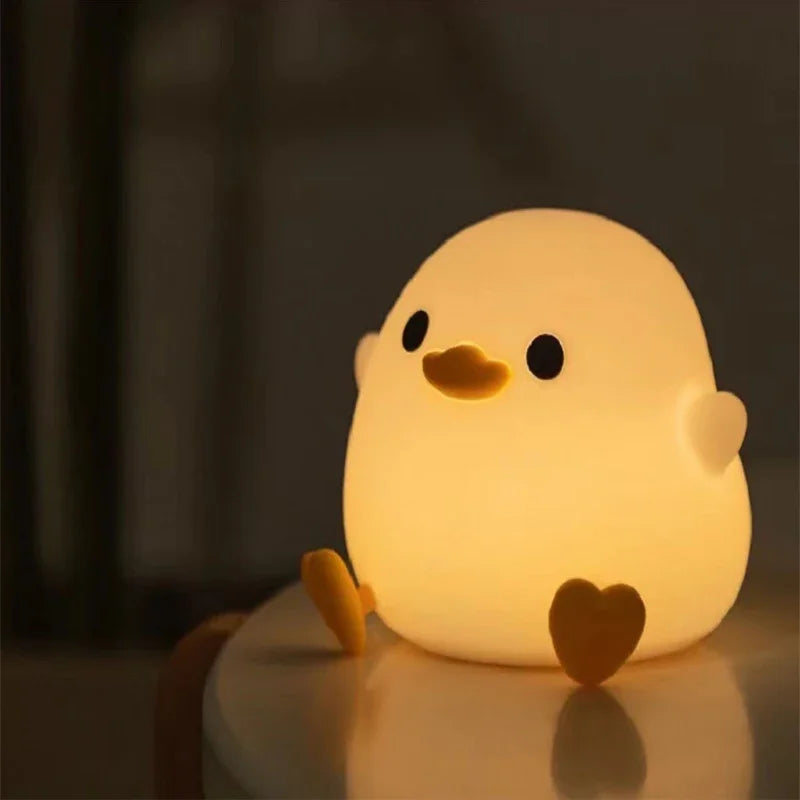veilleuse pingouin tactile a pile dans une boutique