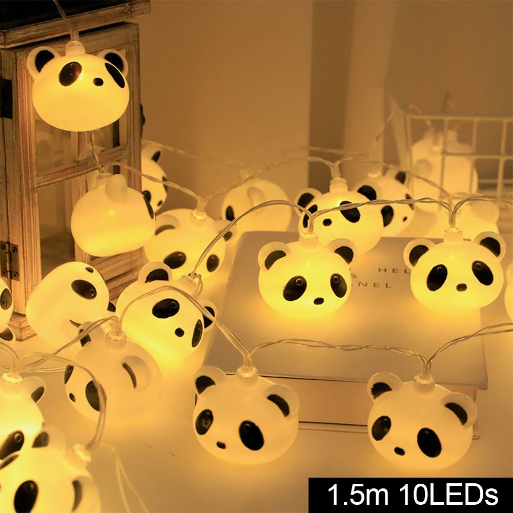veilleuse tête de panda dans une chambre