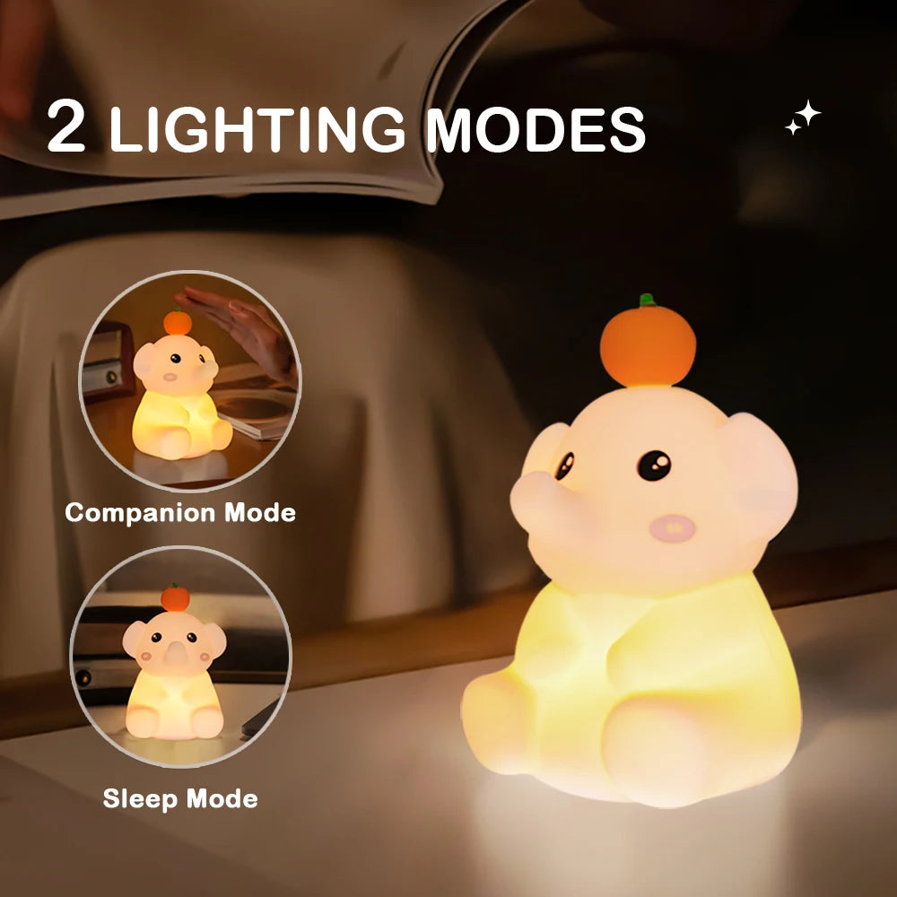 lampe veilleuse éléphant dans un bureau