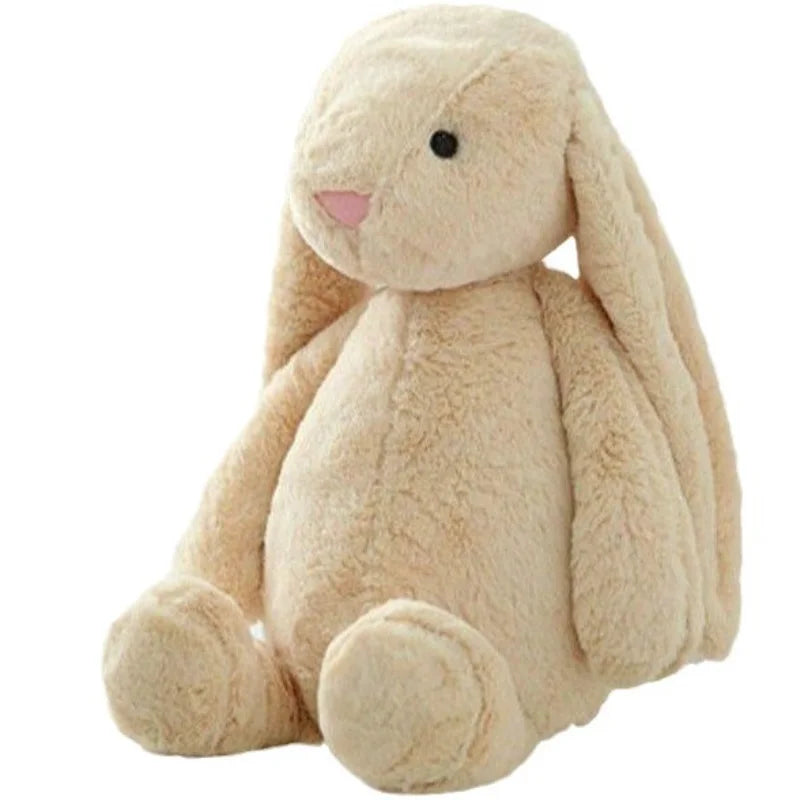 Peluche lapin Veilleuse multicolore dans une chambre