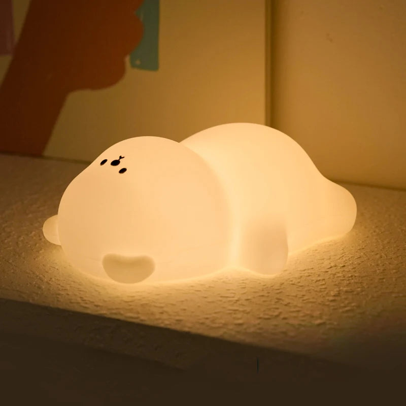 Veilleuse lapin musicale et lumineuse dans une chambre