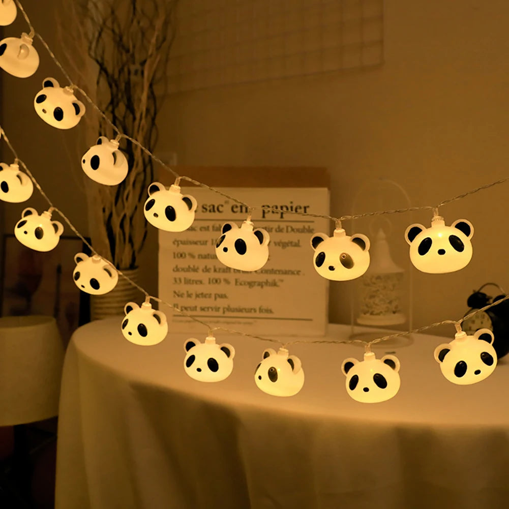 veilleuse tete de panda dans un salon