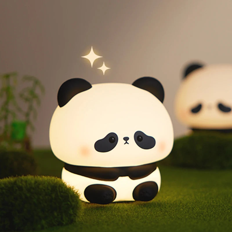 veilleuse panda bebe dans un salon