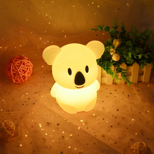 Veilleuse musicale koala dans un salon 