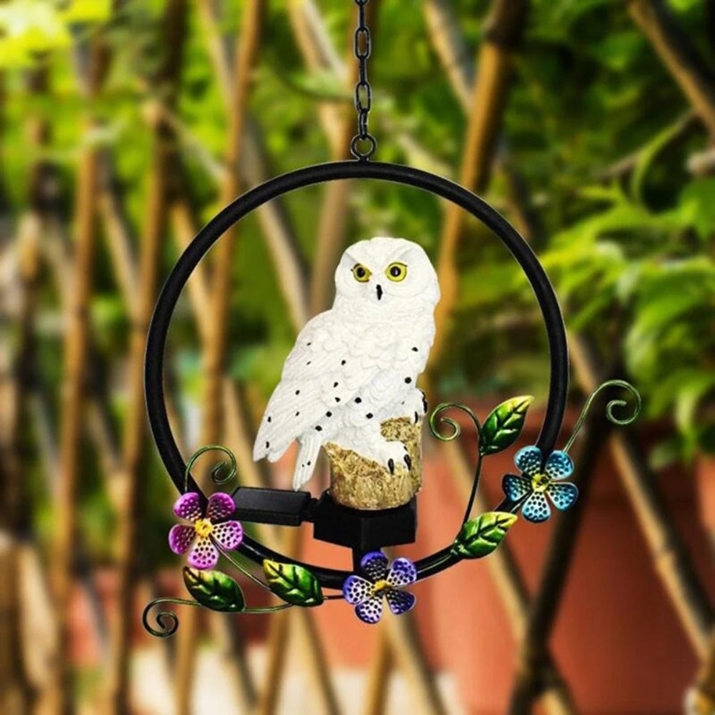 lampe veilleuse hibou dans un jardin