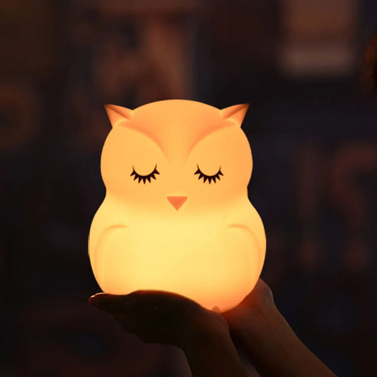 Veilleuse silicone hibou dans une chambre 