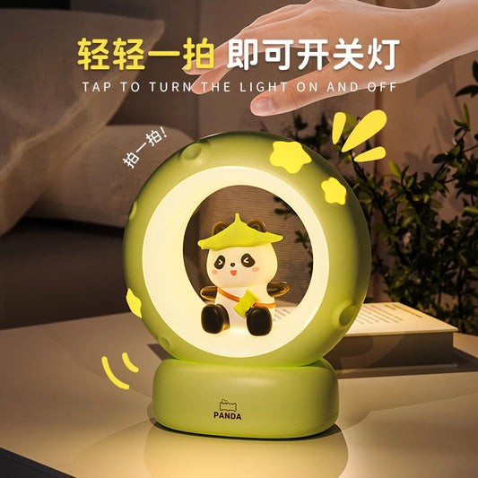 veilleuse musicale panda dans une chambre 