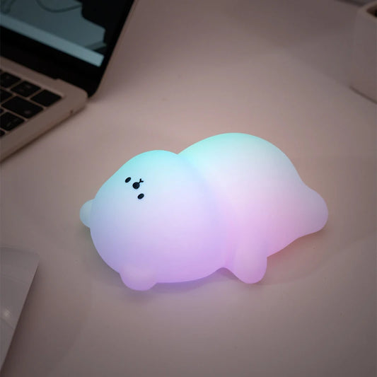 Veilleuse lapin musicale et lumineuse dans un salon 